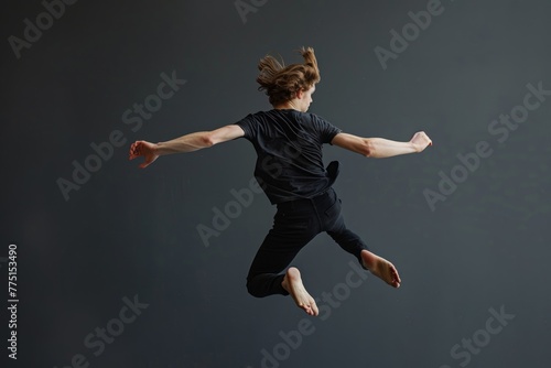Dynamic Freeze Frame of Runner in Action on Pale Blue Wall