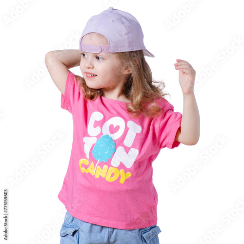 Portrait of a beautiful kid girl in cap smiling looking on white background isolation