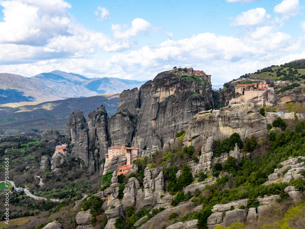 Meteora Monasteries and the surrounding rock formation on a partly cloudy day 6