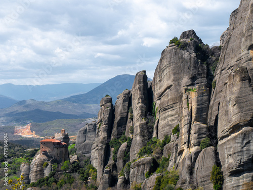 Meteora Monasteries and the surrounding rock formation on a partly cloudy day