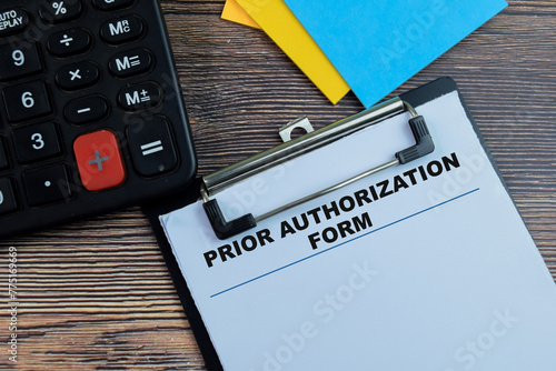 Concept of Prior Authorization Form write on paperwork isolated on wooden background.