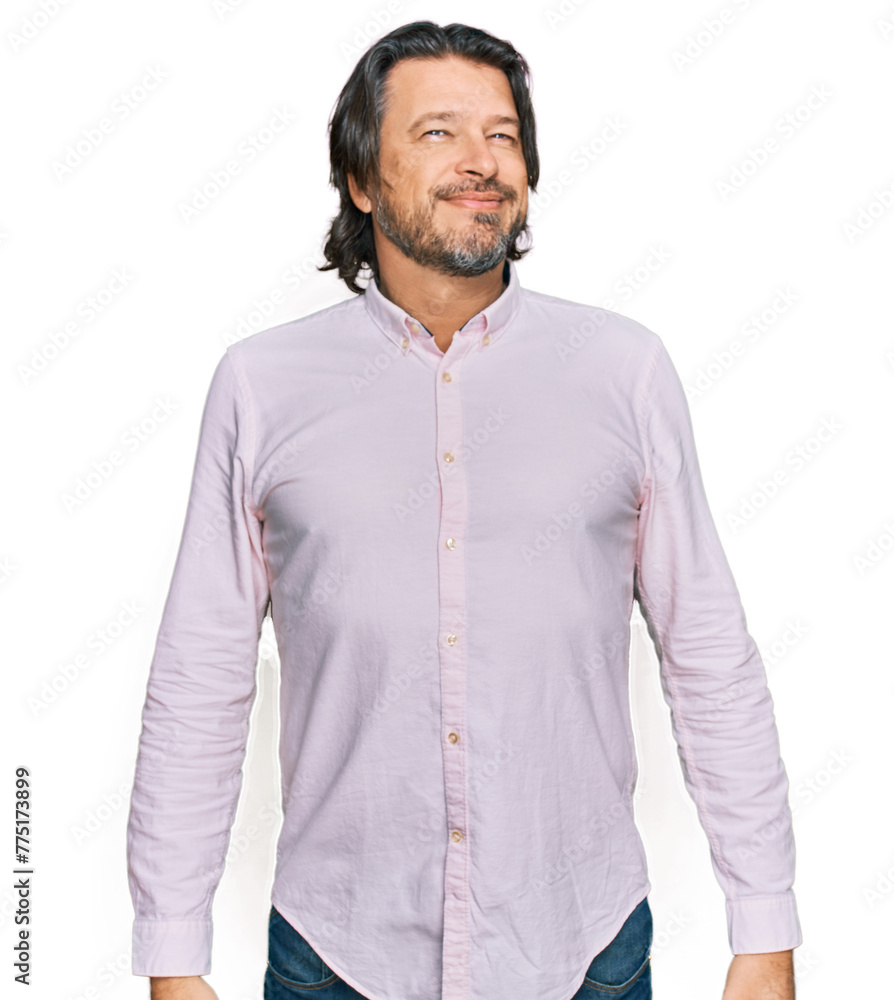 Middle age handsome man wearing business shirt looking away to side with smile on face, natural expression. laughing confident. Middle age handsome man wearing business shirt looking away to side with smile on face, natural expression. laughing confident.