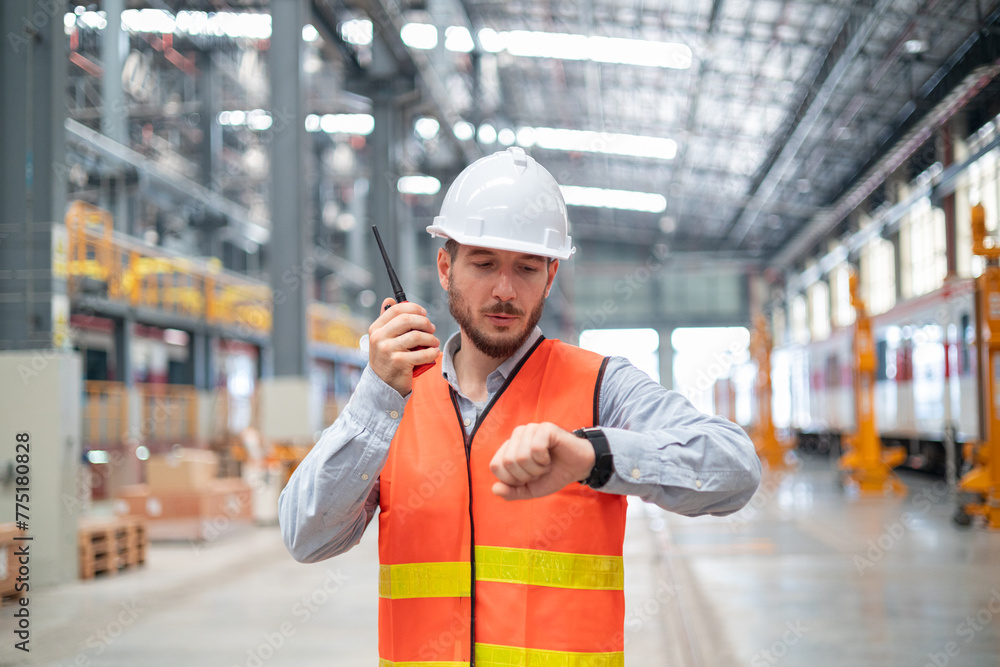 Portrait of a confident engineer in a train maintenance center Portrait of a confident engineer in a train maintenance center