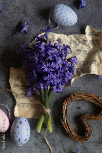 Bouquet of purple hyacinths and various little things, still life in vintage style.