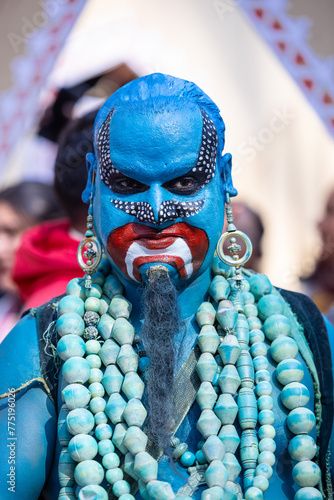 Canvas Print Portrait of an young male artist with painted face to play the character of jinn of aladdin series to entertain tourists