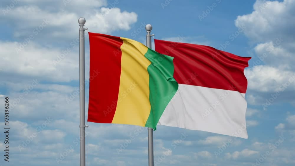 Indonesia and Republic of Guinea two flags waving together, looped video, two country relations concept Indonesia and Republic of Guinea two flags waving together, looped video, two country relations concept