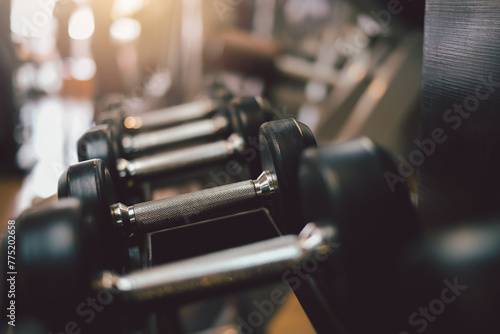 Exercise equipment dumbbell in the gym.