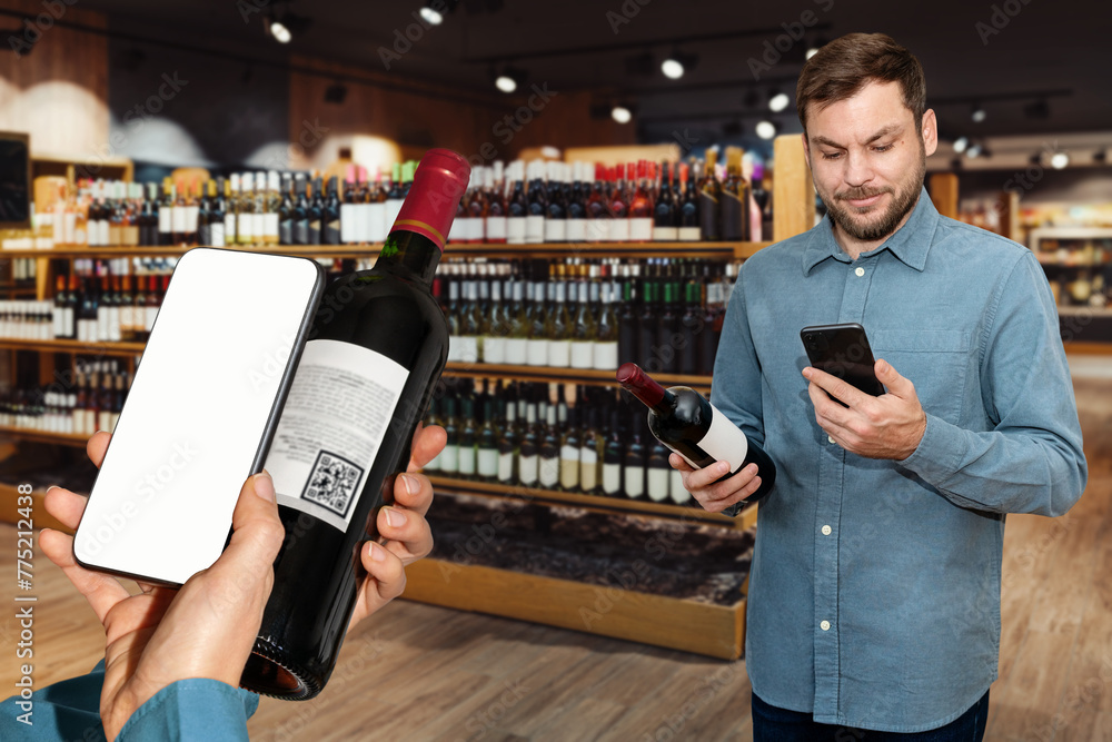 Customers in a wine store scan e-label of wine bottles and reading information about wine using their mobile phones.