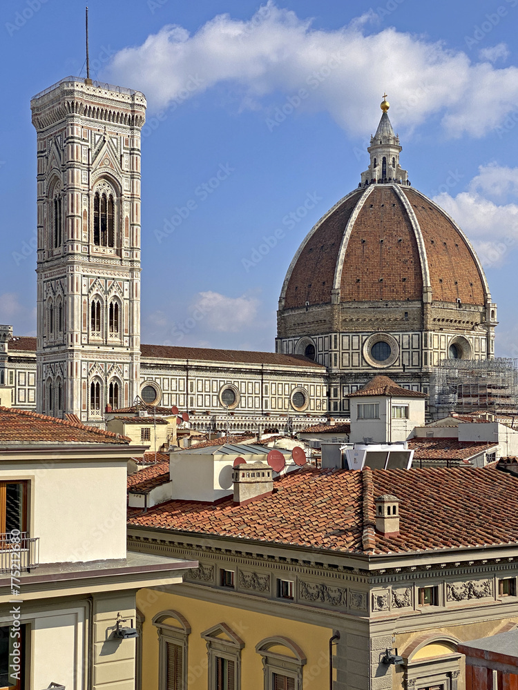Florence, Italy, Brunelleschi's dome seen from the rooftops of the city, with the light of a sunny day.