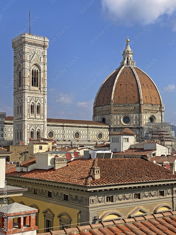 Florence, Italy, Brunelleschi's dome seen from the rooftops of the city, with the light of a sunny day.