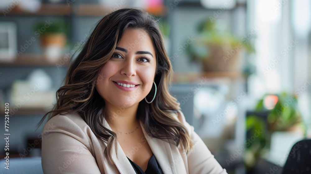 Happy, attractive, mature, plus-sized businesswoman in office environment Happy, attractive, mature, plus-sized businesswoman in office environment