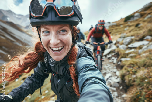 Group of friends on mountain bikes in the Dolomites, Italy 