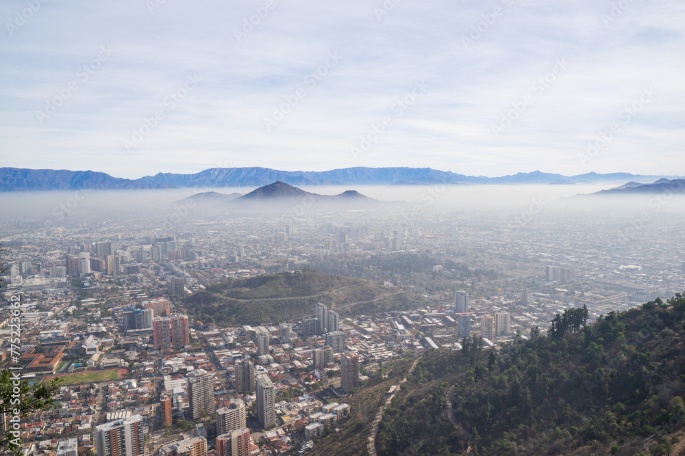 Beautiful landscape of downtown of Santiago city from above. This Chilean capital is one of the largest cities in the Americas. Same like Australia as its summer time will be winter somewhere