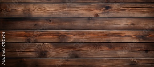 Wooden wall featured in close-up showing a rich dark brown stain, adding depth and texture to the surface