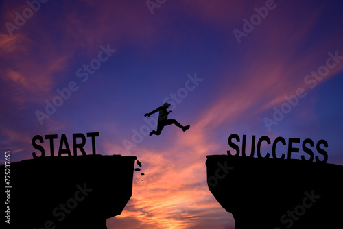 Man jump across text start to success over cliff on sunset background Business strategy concept