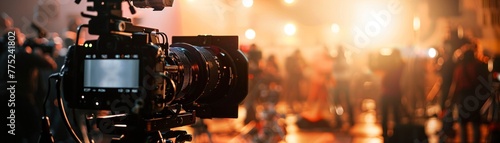 A camera in sharp focus on a bustling film set, offering a glimpse behind the cinematic curtain