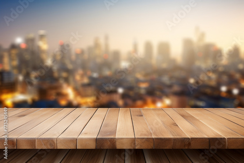 Empty wooden planks or tabletop in front of a blurred bokeh city and modern background a product display background or wallpaper concept with front-lighting 