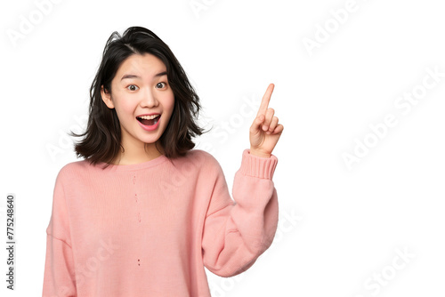 young Asian woman with a wide smile raises her hand upwards indicating that she has a brilliant idea, isolated on a transparent background