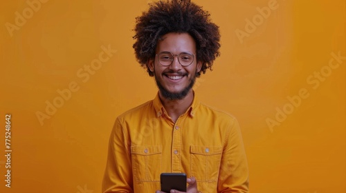 Bearded Man With Glasses Holding Cell Phone