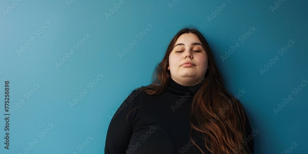 beautiful female model plus size on a simple isolated background beautiful female model plus size on a simple isolated background