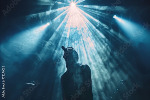 Musician Silhouetted Against Concert Stage Lights