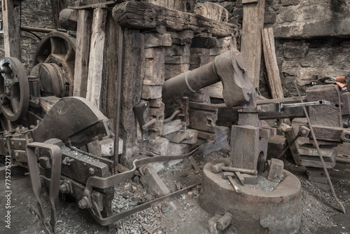 Historic machinery in a blacksmiths worksshop.