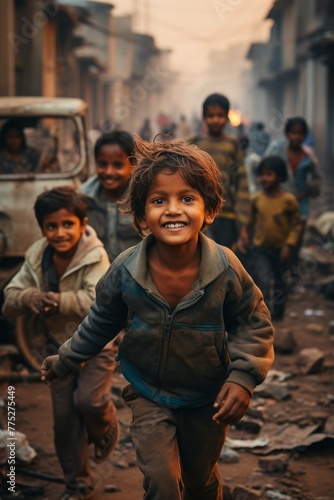 A group of children, energetic and carefree, running down a street, filled with joy and laughter, as they play and enjoy their time together © Vit