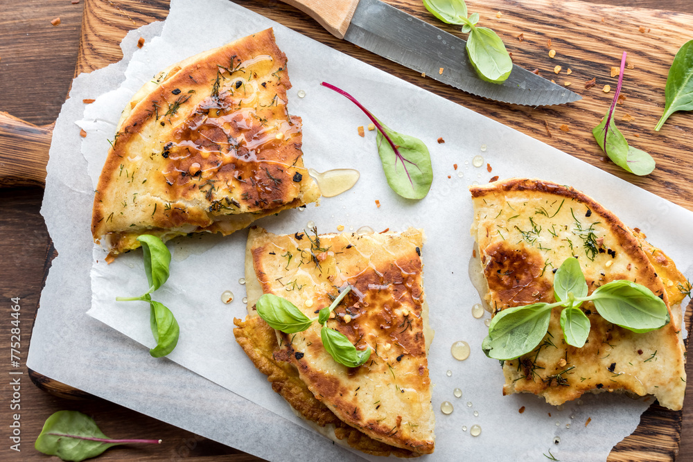 Naan bread breakfast sandwiches with herbs and honey.