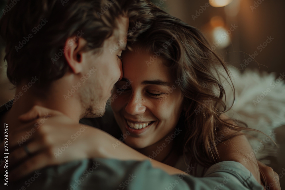 A man and woman are hugging and smiling with their eyes closed A man and woman are hugging and smiling with their eyes closed