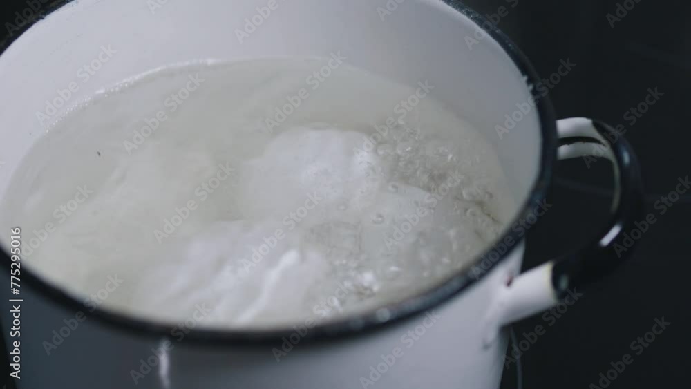 Boiling eggs in a saucepan. Close up. Boiling eggs in a saucepan. Close up.