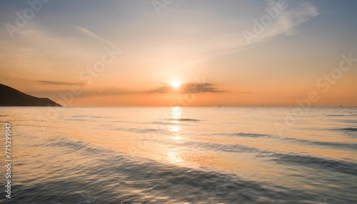 motivational quote start each day with a grateful heart on nature background beautiful sunset at sea horizon with sun reflection on the water