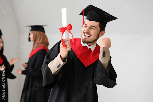 Male graduate student with ...