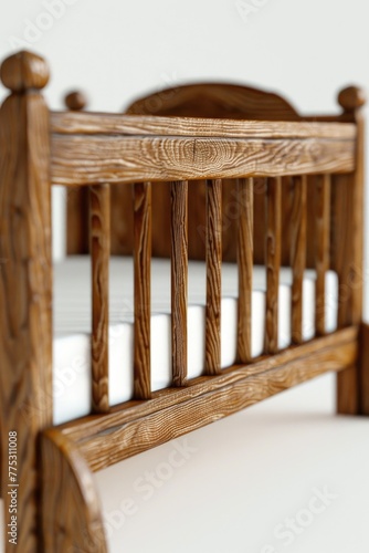 A wooden crib with a white sheet underneath it. Suitable for baby product advertisements