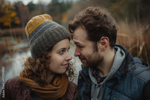 A man and a woman are looking at each other