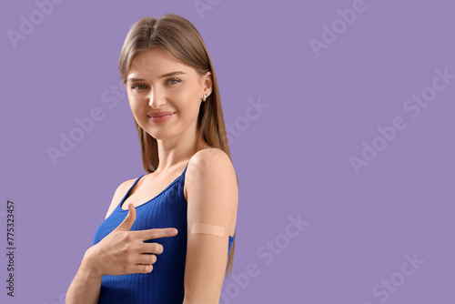 Pretty young woman pointing...