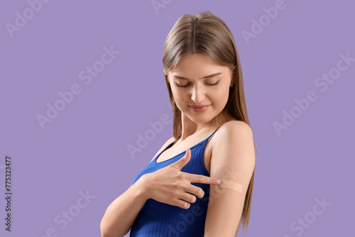 Pretty young woman pointing...