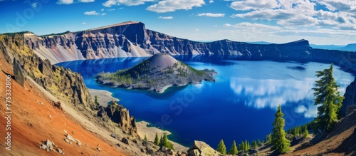 This scenic view showcases a stunning crater with a tranquil lake, surrounded by majestic mountains in the backdrop