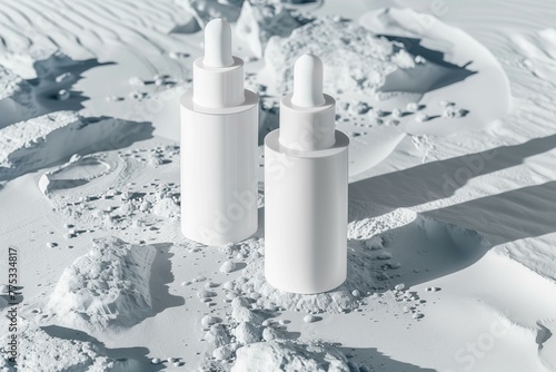 white  blank face serum bottles on a grey moonlike surface sandy texture close up photo