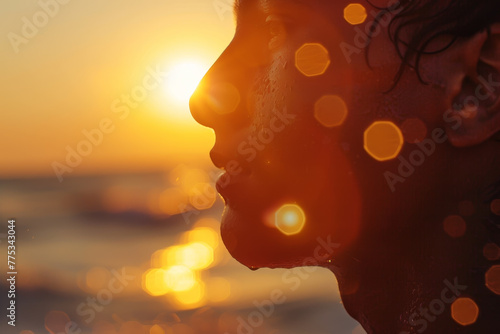 A woman with wet hair is looking at the sun