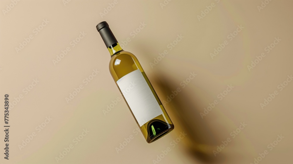 bottle of white wine on a beige background bottle of white wine on a beige background