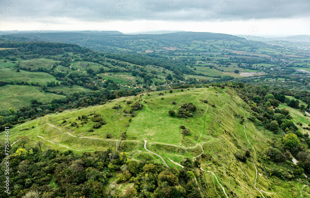 Crickley Hill causewayed camp and hillfort 4000 year occupation site from Neolithic to post Roman. Cotswold Hills, Gloucestershire, UK. Aerial view SW