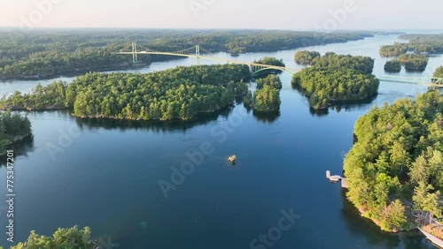 Aerial video of St. Lawrence river in 1000 Islands near US boarder and Hill Island looking at the 1000 Islands Bridge. photo
