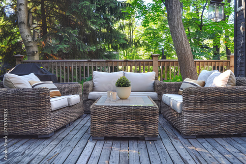Modern Outdoor Patio Furniture Set with White Cushions and Tropical Plants