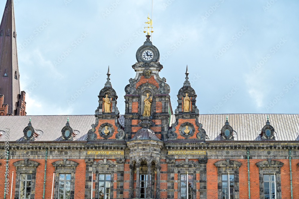 Fototapeta premium Malmö, Sweden - Malmö City Hall, Malmö Rådhus as old famous historical building with decorated facade and blue sky in summer, Malmö, Skane Sweden (3813)