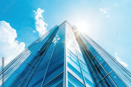 Modern office building with blue sky, and glass facades. Economy, finances, business activity concept