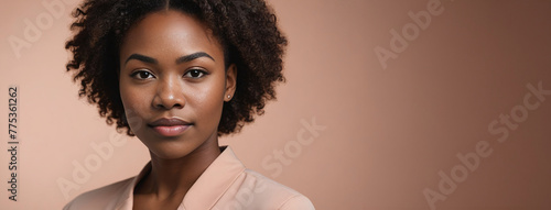 African American Ethnicity 30S Woman Isolated On A Peach Background With Copy Space