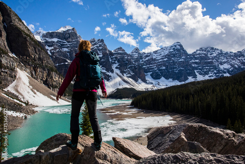 Young woman in Moraine lake, Banff National Park, Canada photo