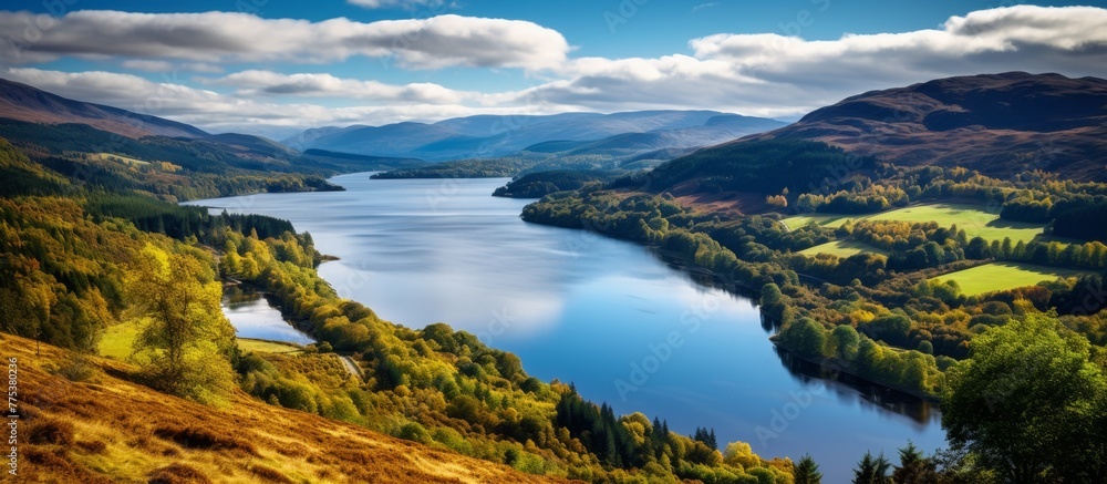 Serene lake surrounded by abundant trees, verdant hills, and natural beauty in a peaceful setting Serene lake surrounded by abundant trees, verdant hills, and natural beauty in a peaceful setting