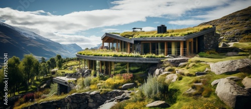 The charming house with a vibrant green roof is nestled atop a gentle slope