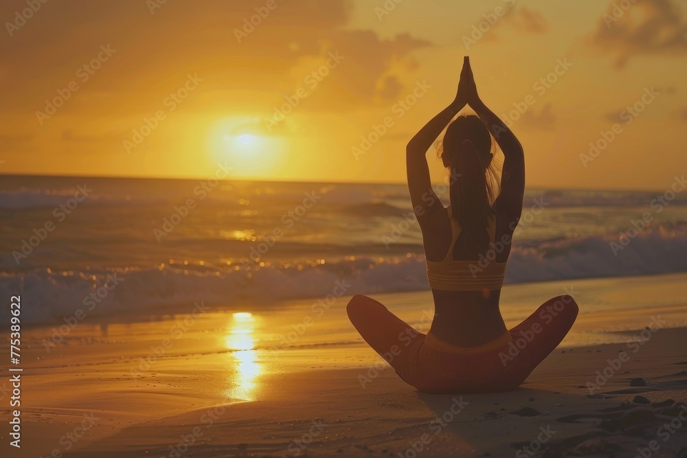 Golden hour yoga on the beach: A tranquil silhouette against a vibrant sunset